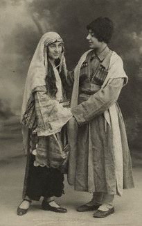 Ida Kar and a friend, by Unknown photographer, cream-toned postcard print, early 1920s