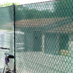 Hole in the fence. Bicycle pathway, Bologna. Photo © Matilde Soligno